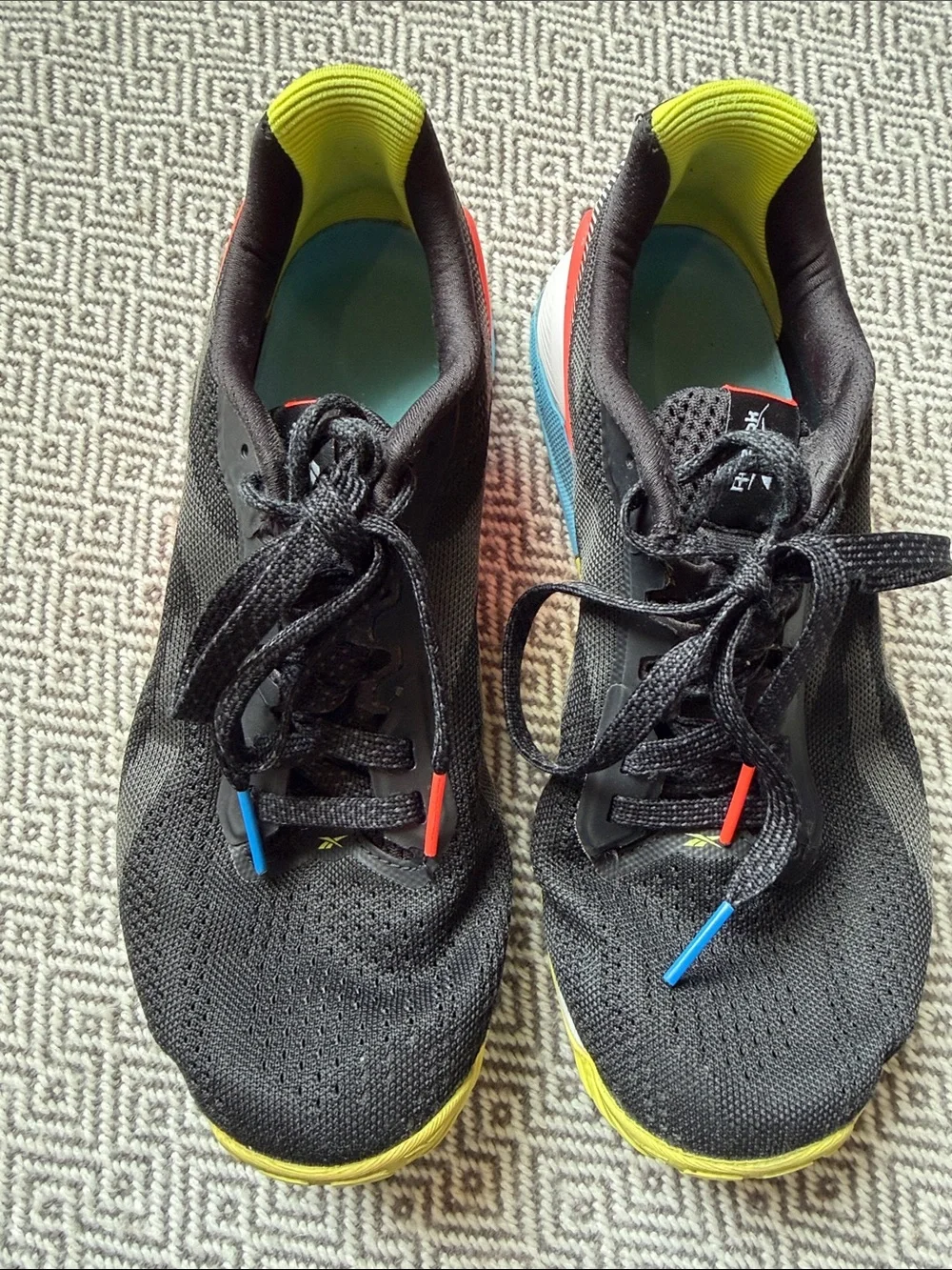 Reebok Nano X1 Black Running Shoes with Yellow, Red and Blue Accents